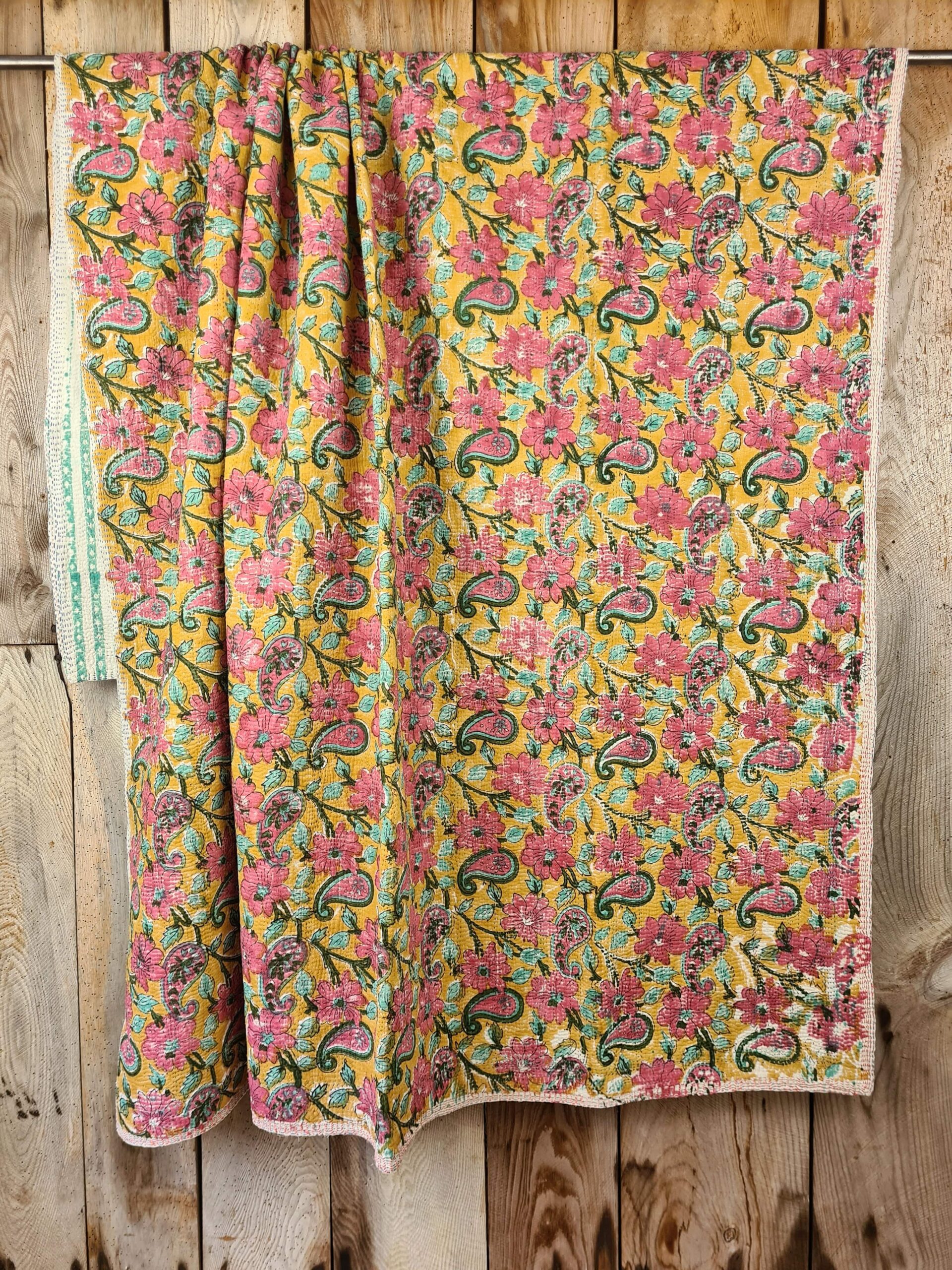 Exquisite vintage Kantha quilt featuring authentic hand-stitched Indian patchwork, responsibly sourced and perfect as unique homeware.