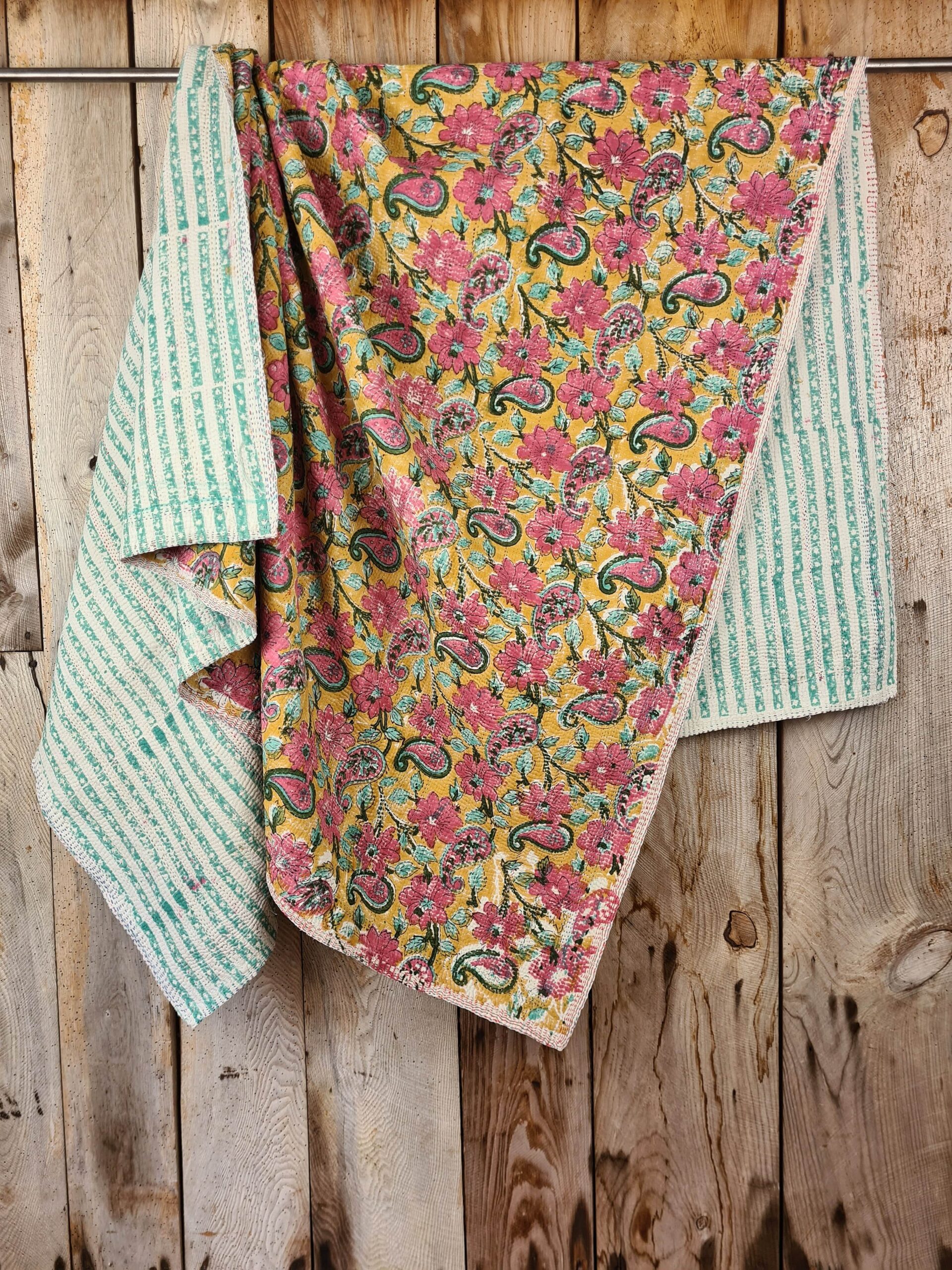 Exquisite vintage Kantha quilt featuring authentic hand-stitched Indian patchwork, responsibly sourced and perfect as unique homeware.