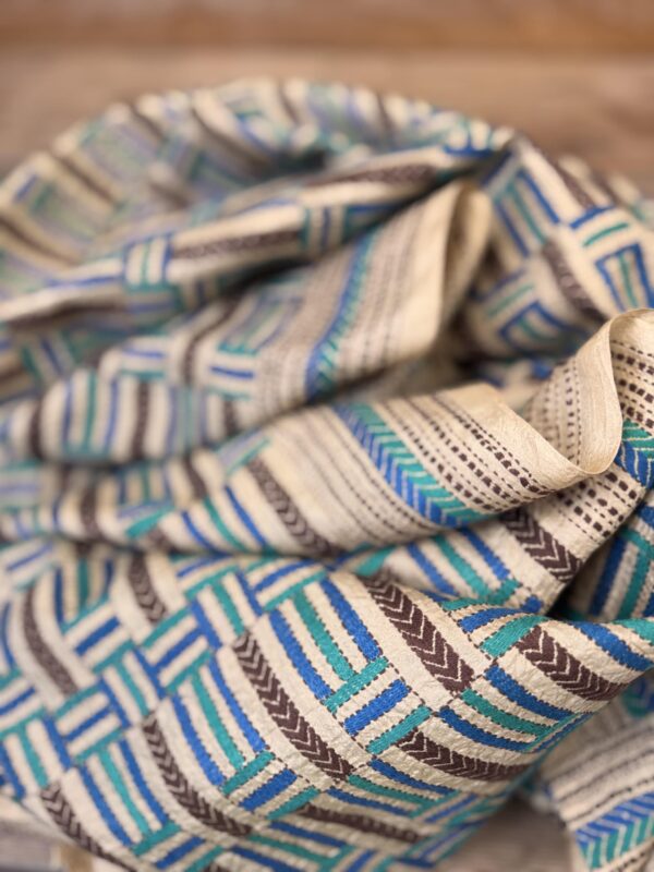 A tussar silk scarf/shawl hand-embroidered with traditional motifs by a NGO in West Bengal