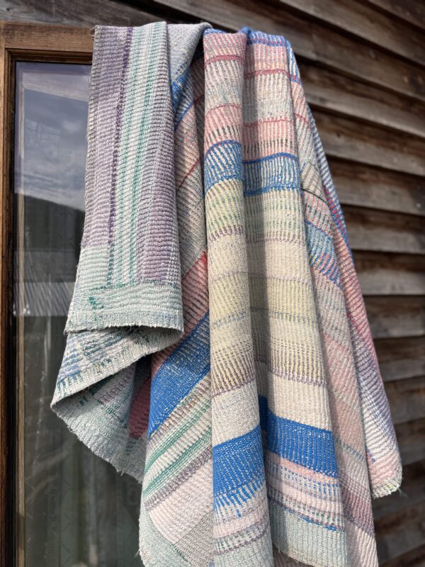 Exquisite vintage Kantha quilt featuring authentic hand-stitched Indian patchwork, responsibly sourced and perfect as unique homeware.