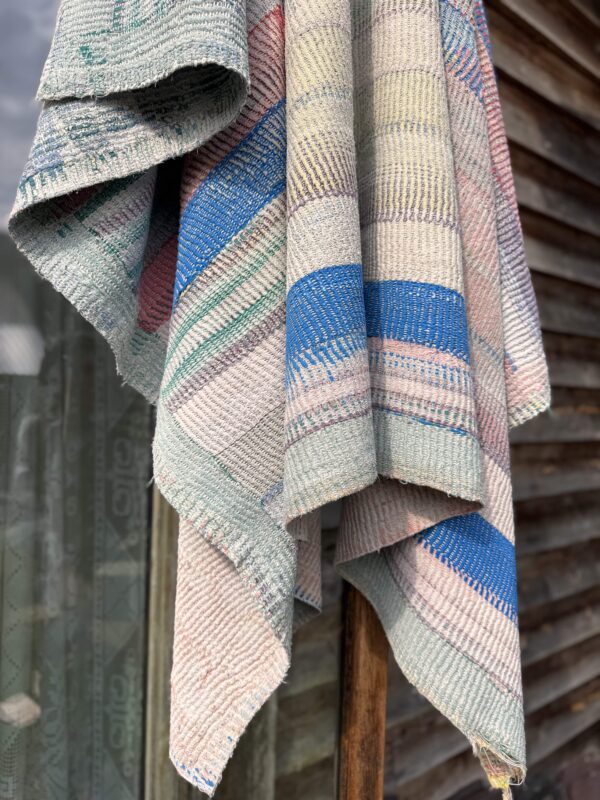 Exquisite vintage Kantha quilt featuring authentic hand-stitched Indian patchwork, responsibly sourced and perfect as unique homeware.