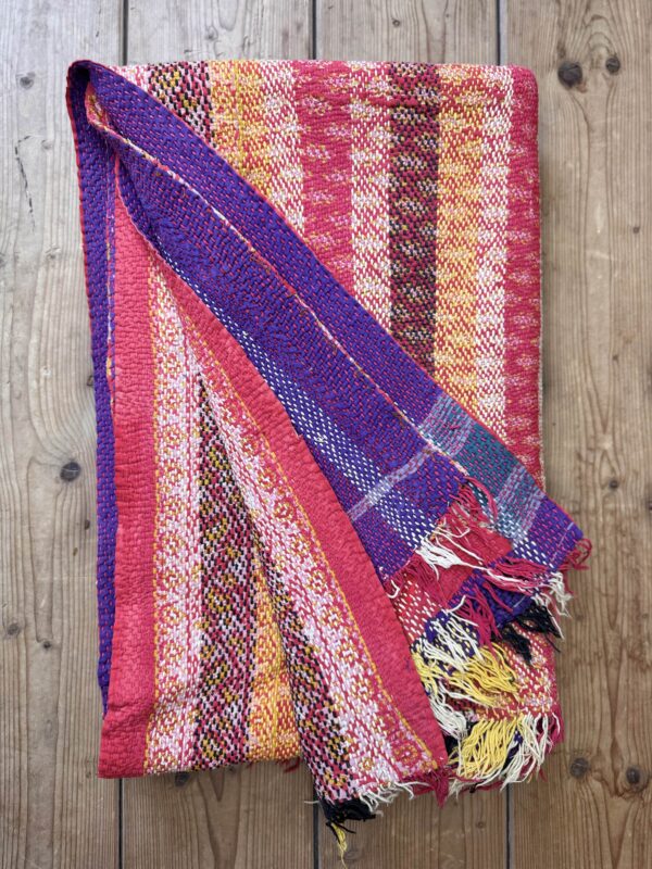 Exquisite vintage Kantha quilt featuring authentic hand-stitched Indian patchwork, responsibly sourced and perfect as unique homeware.