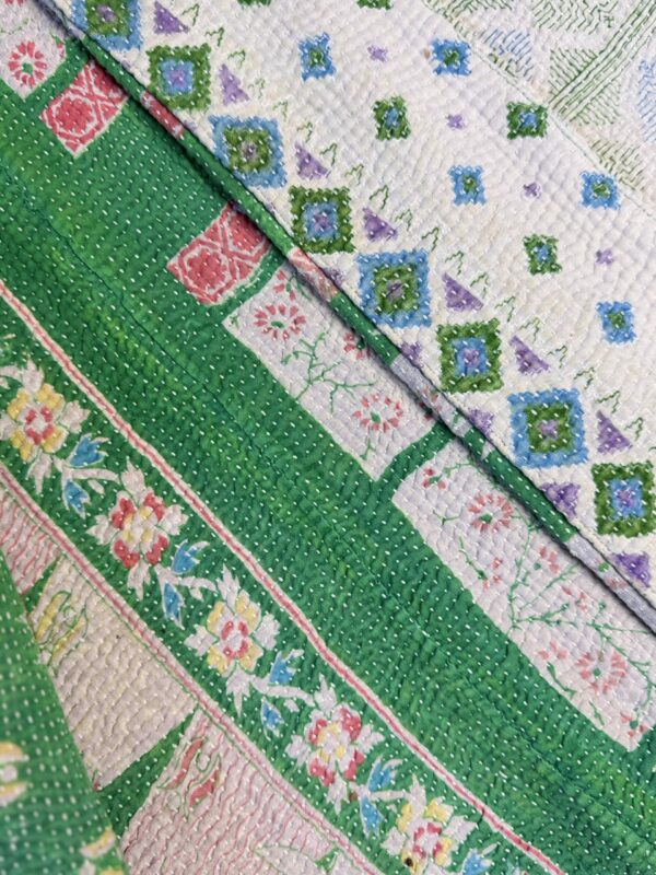 Vintage cotton Kantha Jacket with finely hand stitched details, rich textures and colours.