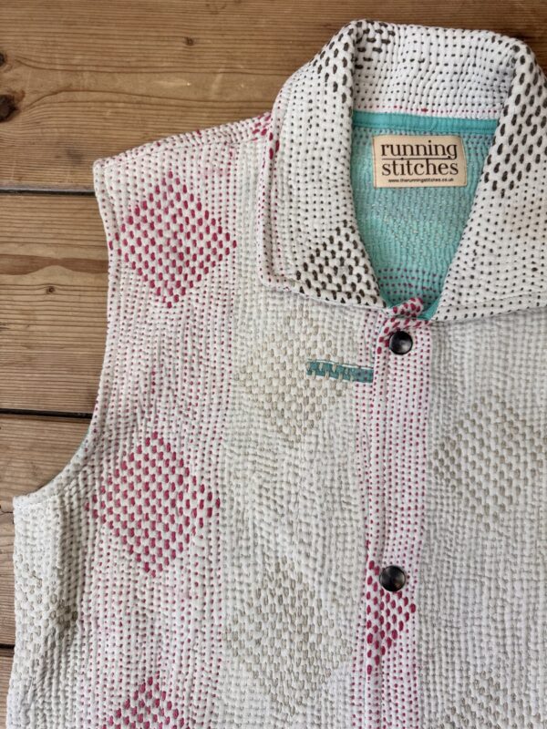 Vintage cotton Kantha Waistcoat with finely hand stitched details, rich textures and colours.