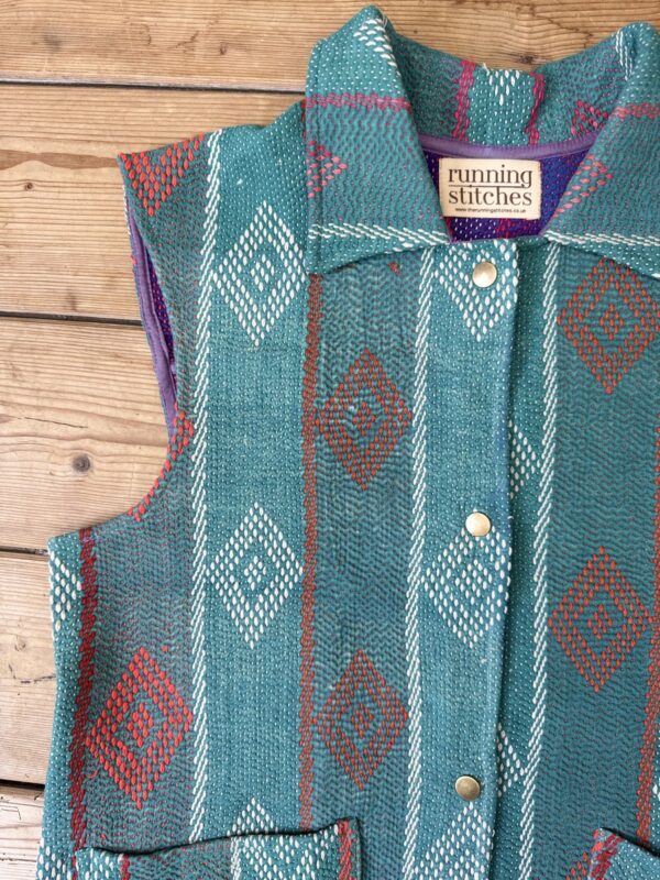 Vintage cotton Kantha Waistcoat with finely hand stitched details, rich textures and colours.