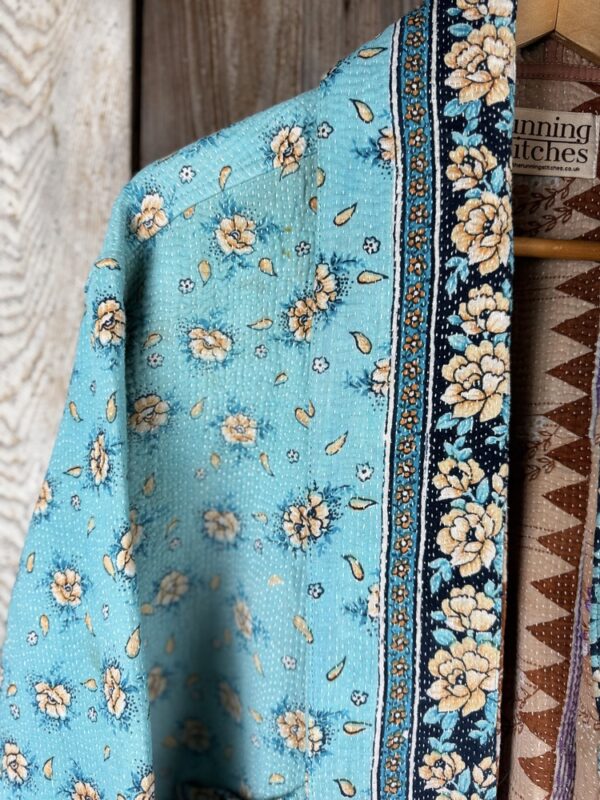 Vintage cotton Kantha Jacket with finely hand stitched details, rich textures and colours.