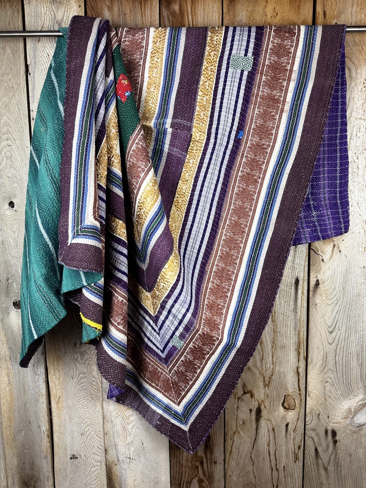 Exquisite vintage Kantha quilt featuring authentic hand-stitched Indian patchwork, responsibly sourced and perfect as unique homeware.