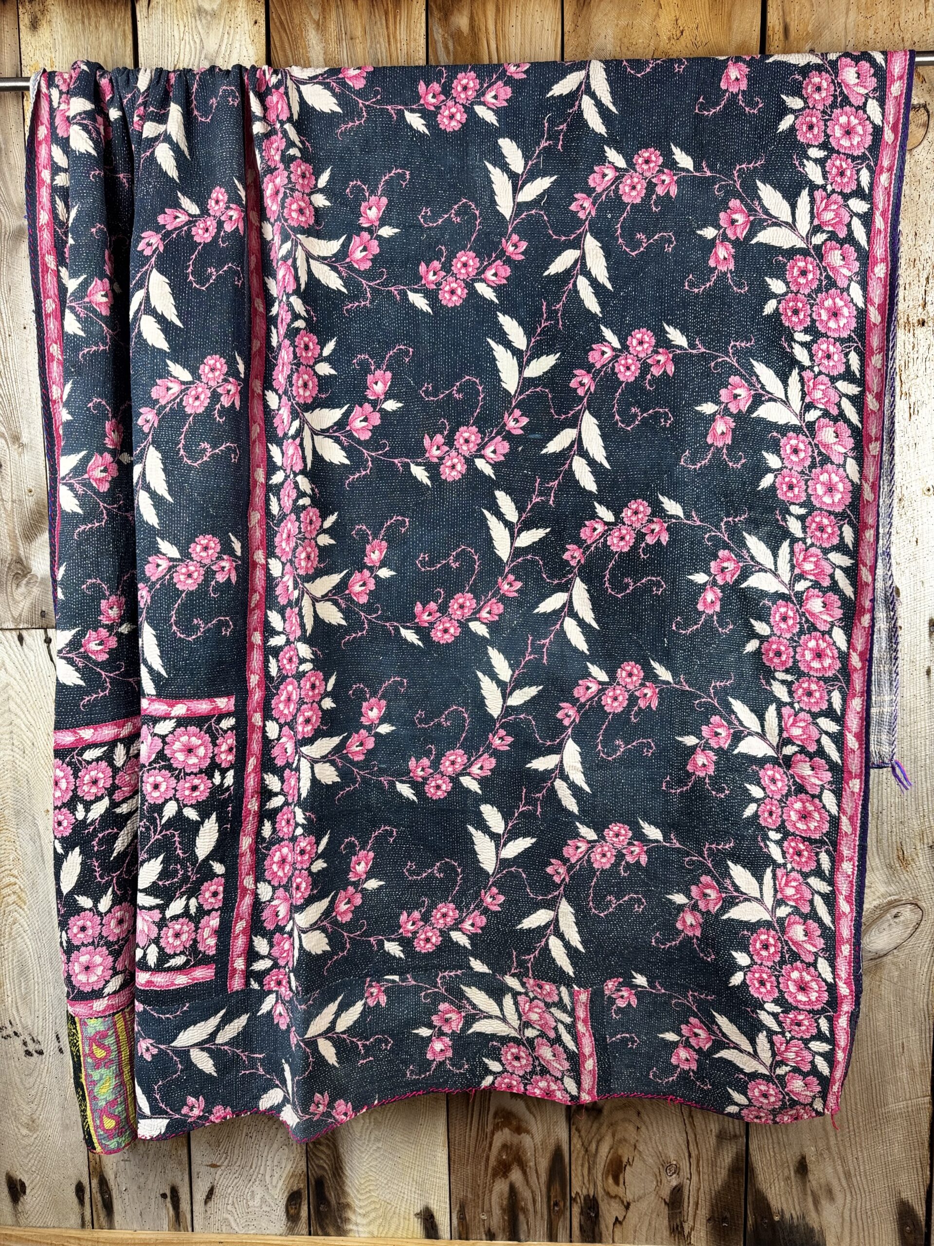 Exquisite vintage Kantha quilt featuring authentic hand-stitched Indian patchwork, responsibly sourced and perfect as unique homeware.