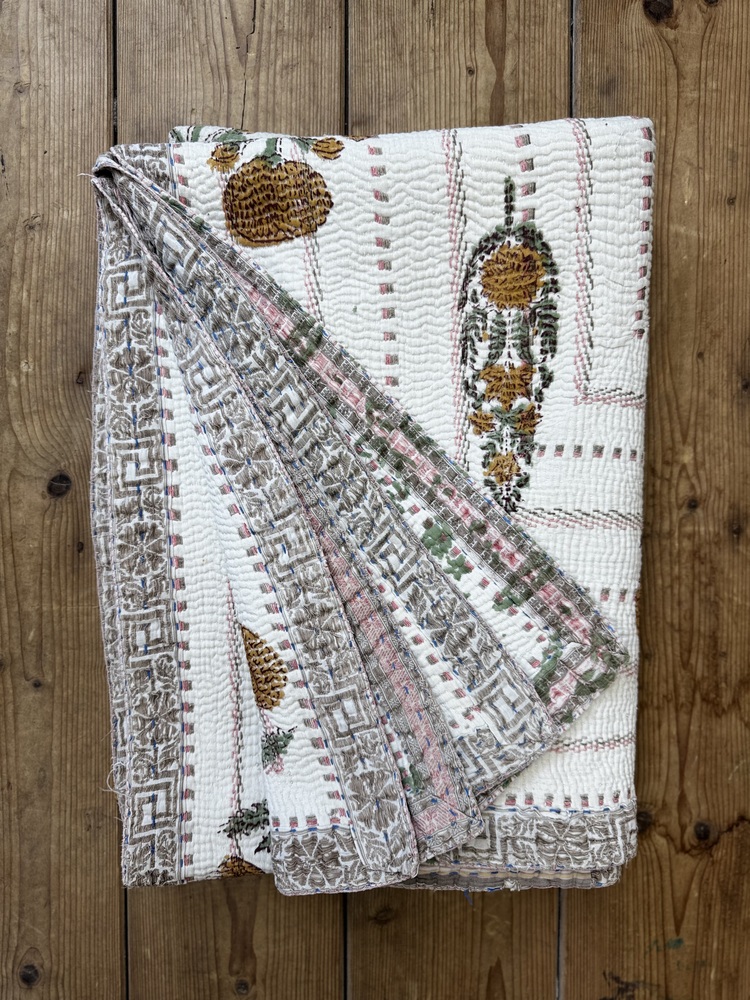 Exquisite vintage block printed Kantha quilt featuring authentic hand-stitched motifs and embroidery, responsibly sourced and perfect as unique homeware.