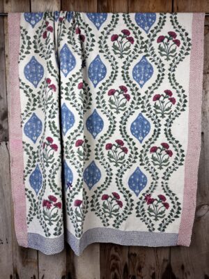 Exquisite vintage block printed Kantha quilt featuring authentic hand-stitched motifs and embroidery, responsibly sourced and perfect as unique homeware.