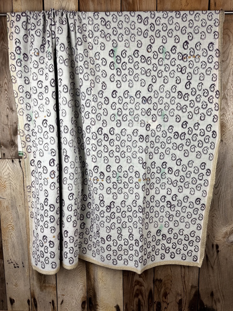 Exquisite vintage block printed Kantha quilt featuring authentic hand-stitched motifs and embroidery, responsibly sourced and perfect as unique homeware.