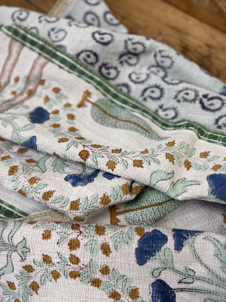 Exquisite vintage block printed Kantha quilt featuring authentic hand-stitched motifs and embroidery, responsibly sourced and perfect as unique homeware.