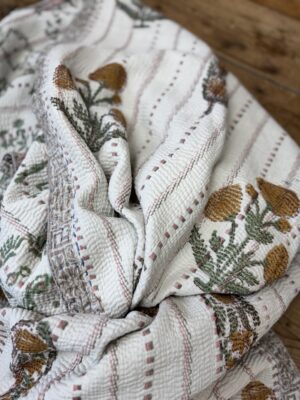 Exquisite vintage block printed Kantha quilt featuring authentic hand-stitched motifs and embroidery, responsibly sourced and perfect as unique homeware.