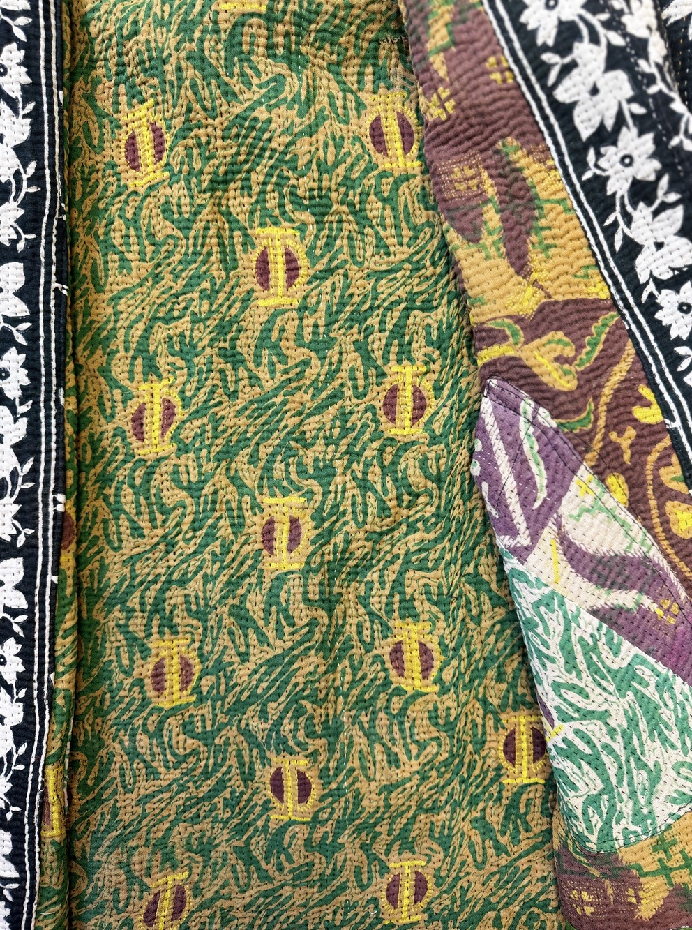 Vintage cotton Kantha Jacket with finely hand stitched details, rich textures and colours.
