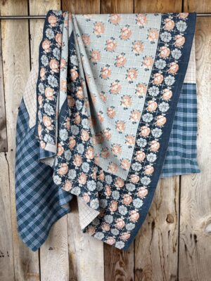 Exquisite vintage Kantha quilt featuring authentic hand-stitched Indian patchwork, responsibly sourced and perfect as unique homeware.