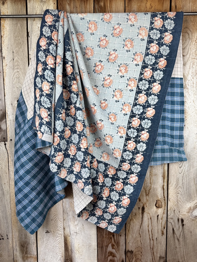 Exquisite vintage Kantha quilt featuring authentic hand-stitched Indian patchwork, responsibly sourced and perfect as unique homeware.