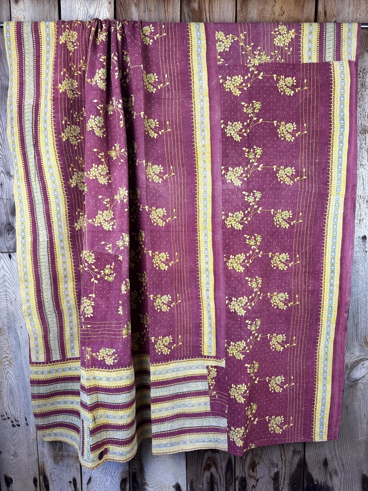 Exquisite vintage Kantha quilt featuring authentic hand-stitched Indian patchwork, responsibly sourced and perfect as unique homeware.