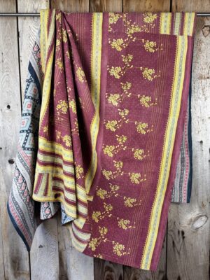 Exquisite vintage Kantha quilt featuring authentic hand-stitched Indian patchwork, responsibly sourced and perfect as unique homeware.