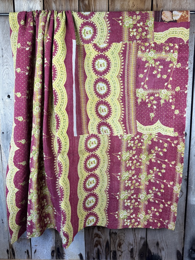 Exquisite vintage Kantha quilt featuring authentic hand-stitched Indian patchwork, responsibly sourced and perfect as unique homeware.