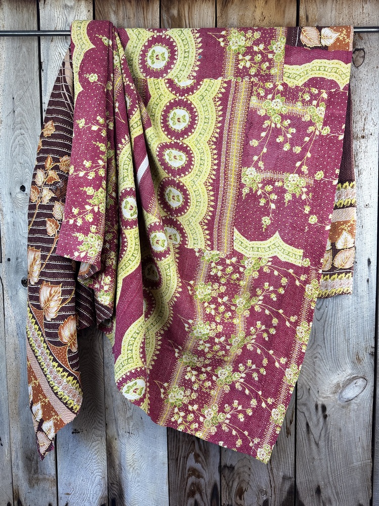 Exquisite vintage Kantha quilt featuring authentic hand-stitched Indian patchwork, responsibly sourced and perfect as unique homeware.
