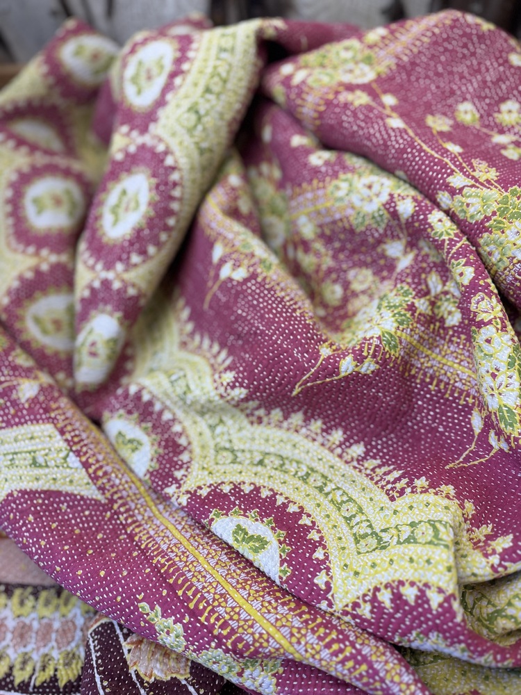 Exquisite vintage Kantha quilt featuring authentic hand-stitched Indian patchwork, responsibly sourced and perfect as unique homeware.