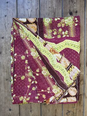 Exquisite vintage Kantha quilt featuring authentic hand-stitched Indian patchwork, responsibly sourced and perfect as unique homeware.