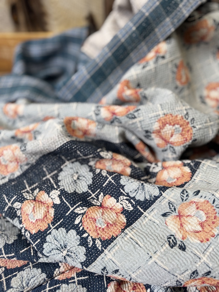 Exquisite vintage Kantha quilt featuring authentic hand-stitched Indian patchwork, responsibly sourced and perfect as unique homeware.
