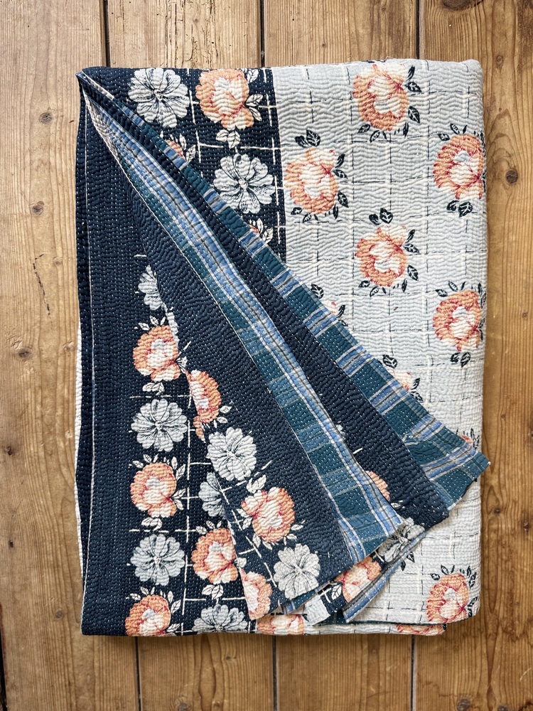 Exquisite vintage Kantha quilt featuring authentic hand-stitched Indian patchwork, responsibly sourced and perfect as unique homeware.