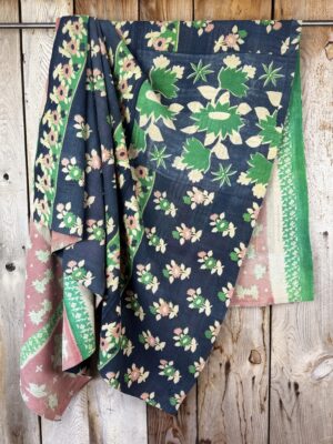 Exquisite vintage Kantha quilt featuring authentic hand-stitched Indian patchwork, responsibly sourced and perfect as unique homeware.