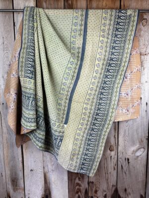 Exquisite vintage Kantha quilt featuring authentic hand-stitched Indian patchwork, responsibly sourced and perfect as unique homeware.
