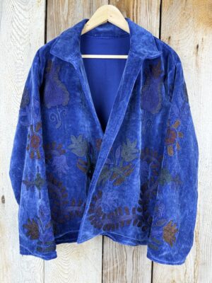 Hand embroidered cotton velvet jacket with soft texture, cosy easy fit, and intricate artisanal detailing.