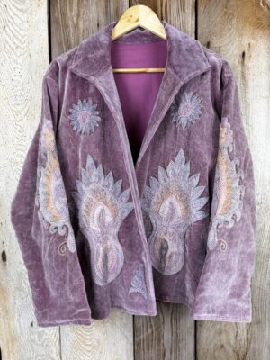 Hand embroidered cotton velvet jacket with soft texture, cosy easy fit, and intricate artisanal detailing.