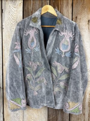 Hand embroidered cotton velvet jacket with soft texture, cosy easy fit, and intricate artisanal detailing.