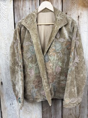 Hand embroidered cotton velvet jacket with soft texture, cosy easy fit, and intricate artisanal detailing.