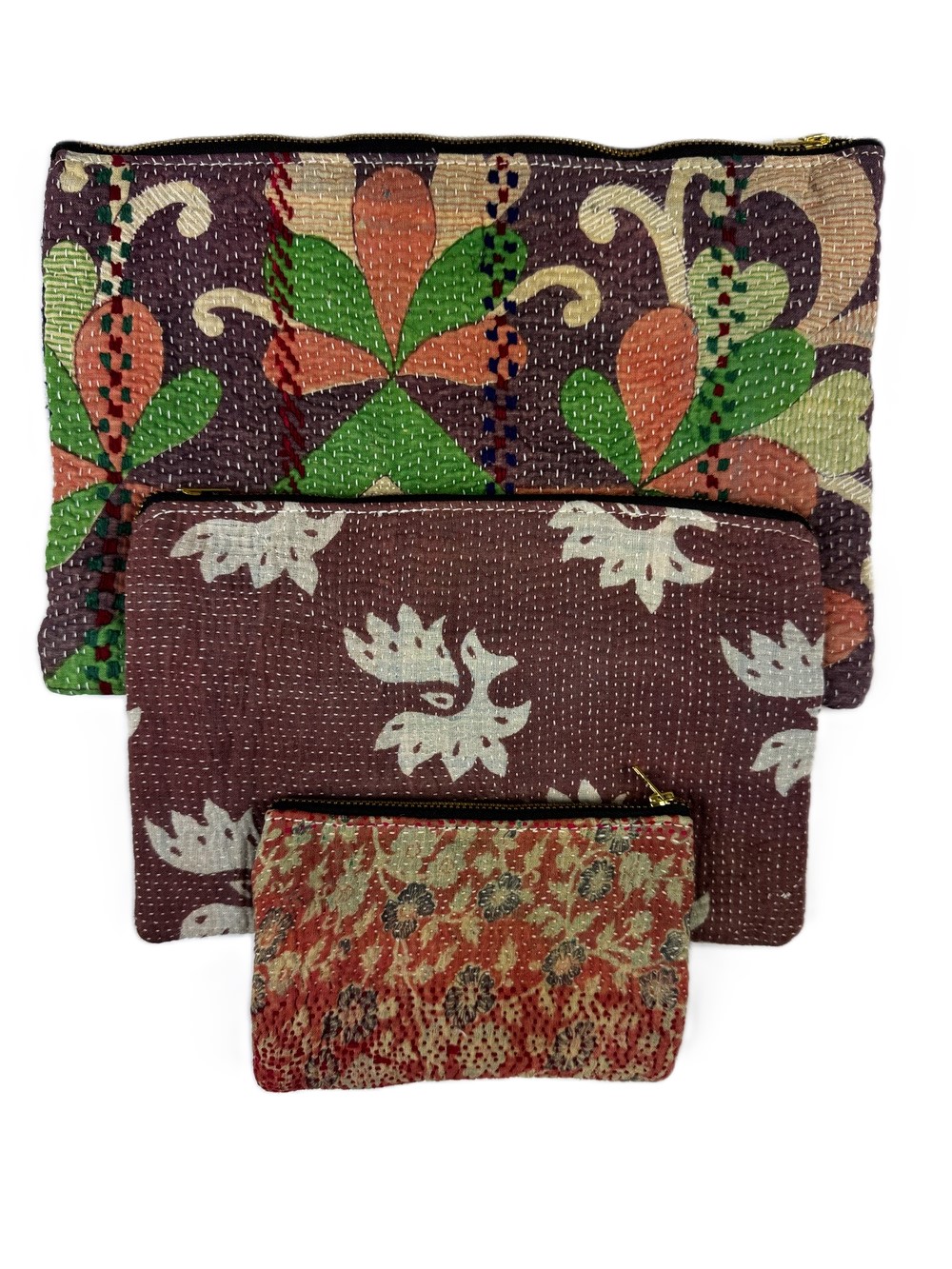 Colourful cotton kantha bags, pockets and purses, great for organising the smaller things in life. Made from recycled kantha quilts for the perfect accessory.
