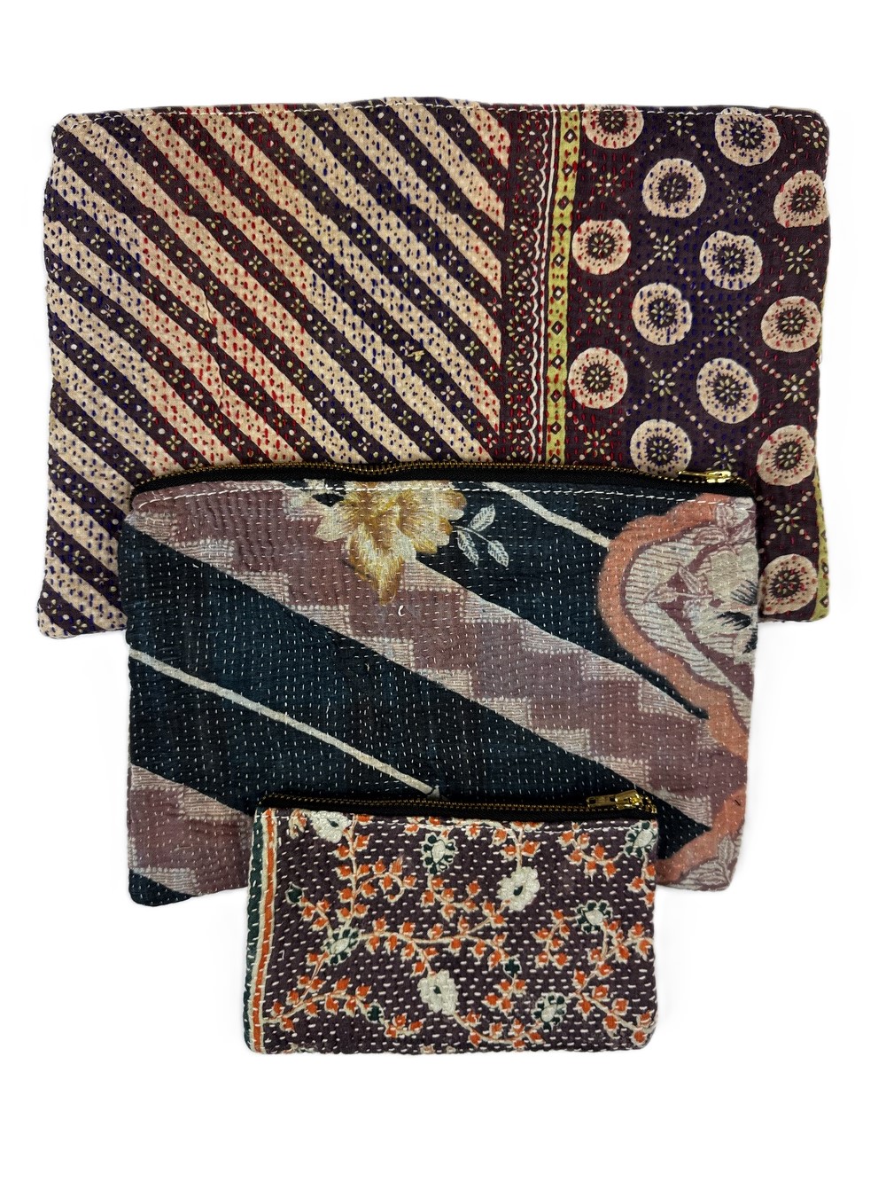 Colourful cotton kantha bags, pockets and purses, great for organising the smaller things in life. Made from recycled kantha quilts for the perfect accessory.