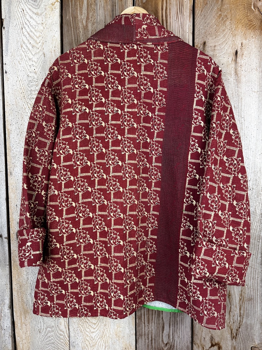 Vintage cotton Clara Kantha Jacket with finely hand stitched details, rich textures and colours.