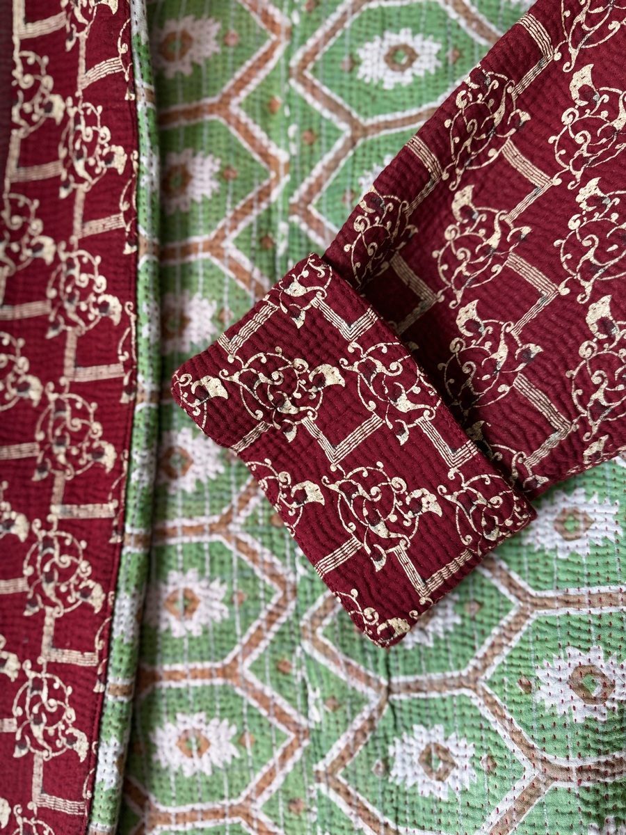 Vintage cotton Clara Kantha Jacket with finely hand stitched details, rich textures and colours.
