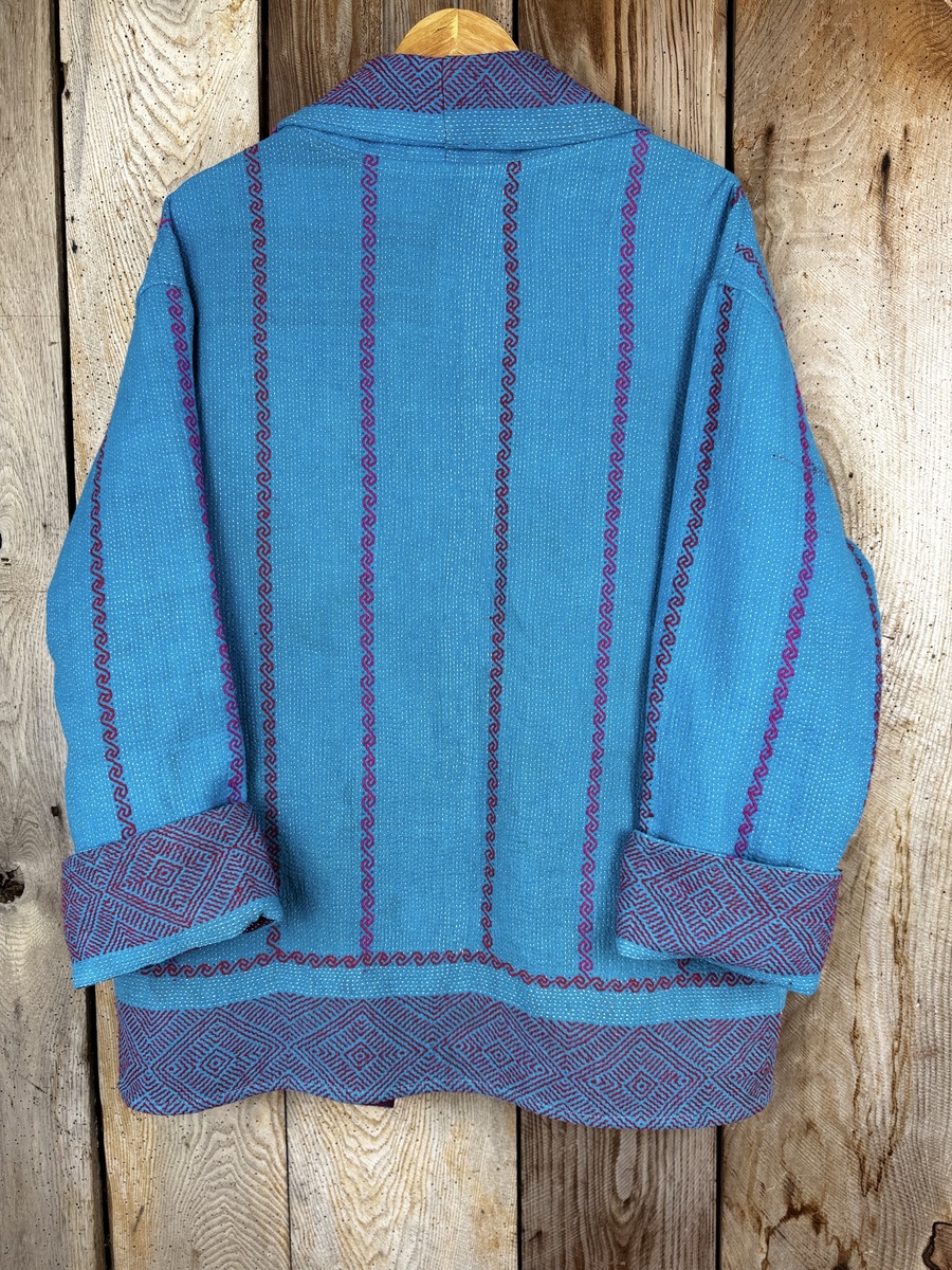 Vintage cotton Clara Kantha Jacket with finely hand stitched details, rich textures and colours.