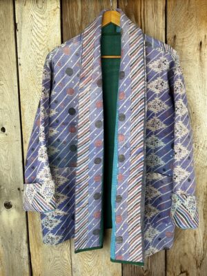 Vintage cotton Clara Kantha Jacket with finely hand stitched details, rich textures and colours.