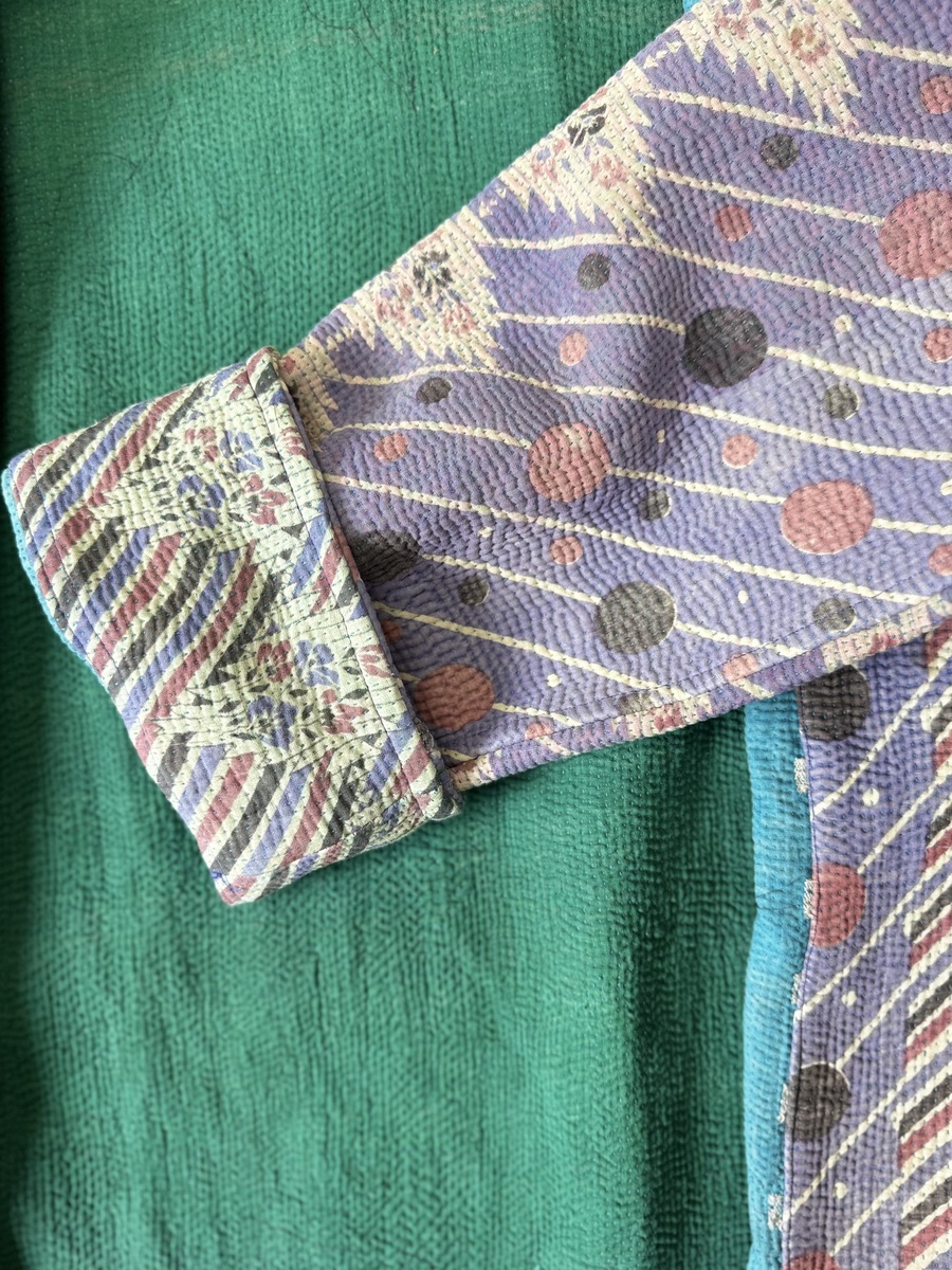Vintage cotton Clara Kantha Jacket with finely hand stitched details, rich textures and colours.