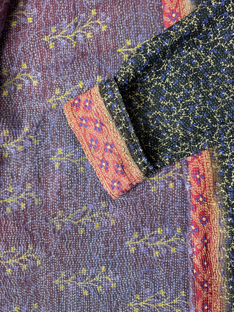 Vintage cotton Clara Kantha Jacket with finely hand stitched details, rich textures and colours.