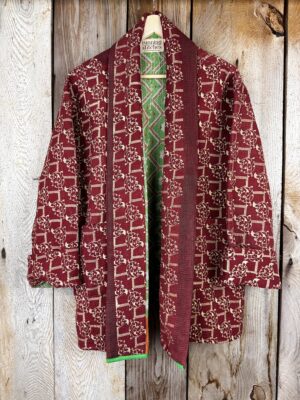 Vintage cotton Clara Kantha Jacket with finely hand stitched details, rich textures and colours.