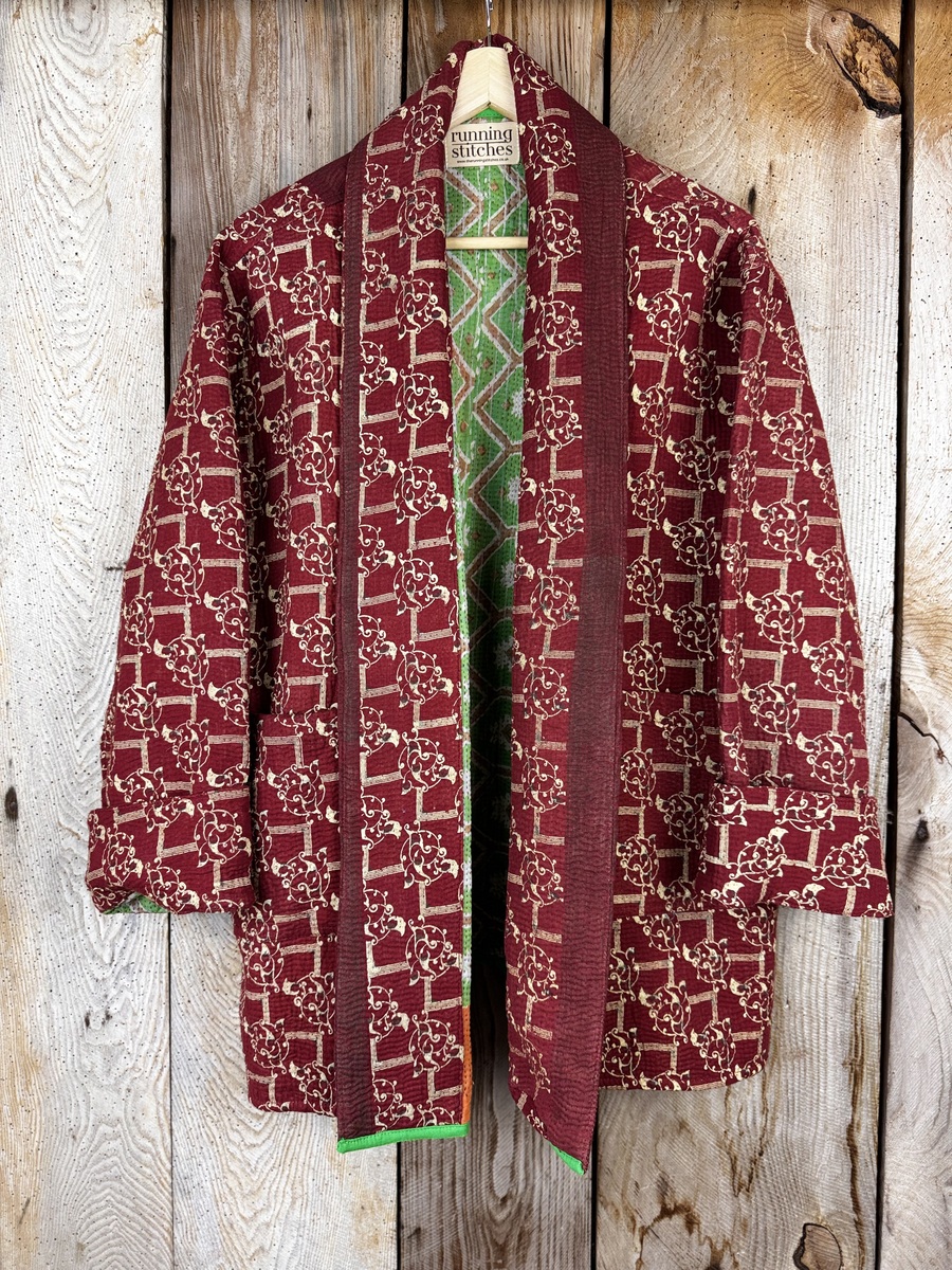 Vintage cotton Clara Kantha Jacket with finely hand stitched details, rich textures and colours.