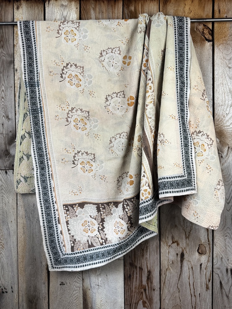 Exquisite vintage Kantha quilt featuring authentic hand-stitched Indian patchwork, responsibly sourced and perfect as unique homeware.
