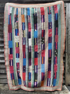 Exquisite vintage Kantha quilt featuring authentic hand-stitched Indian patchwork, responsibly sourced and perfect as unique homeware.