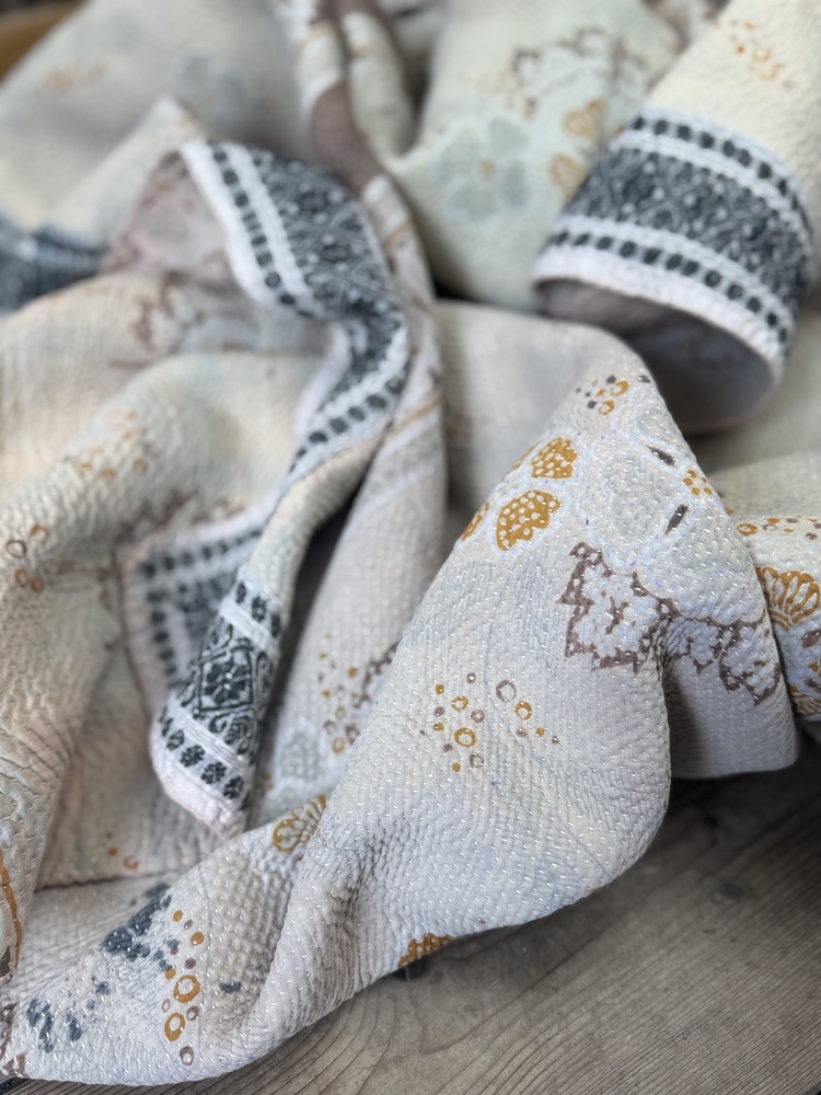 Exquisite vintage Kantha quilt featuring authentic hand-stitched Indian patchwork, responsibly sourced and perfect as unique homeware.