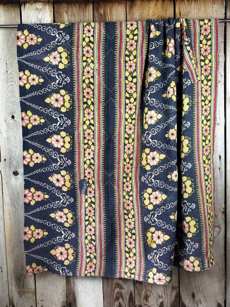 Exquisite vintage Kantha quilt featuring authentic hand-stitched Indian patchwork, responsibly sourced and perfect as unique homeware.