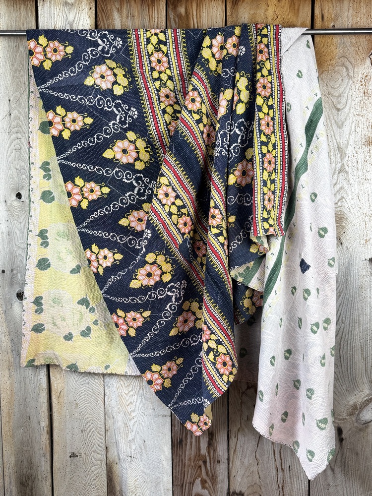 Exquisite vintage Kantha quilt featuring authentic hand-stitched Indian patchwork, responsibly sourced and perfect as unique homeware.