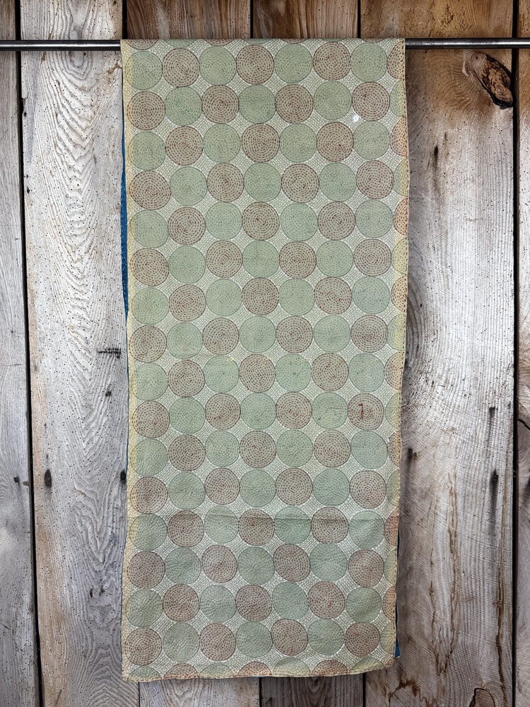 Silk scarf made from hand-stitched recycled sari silk.